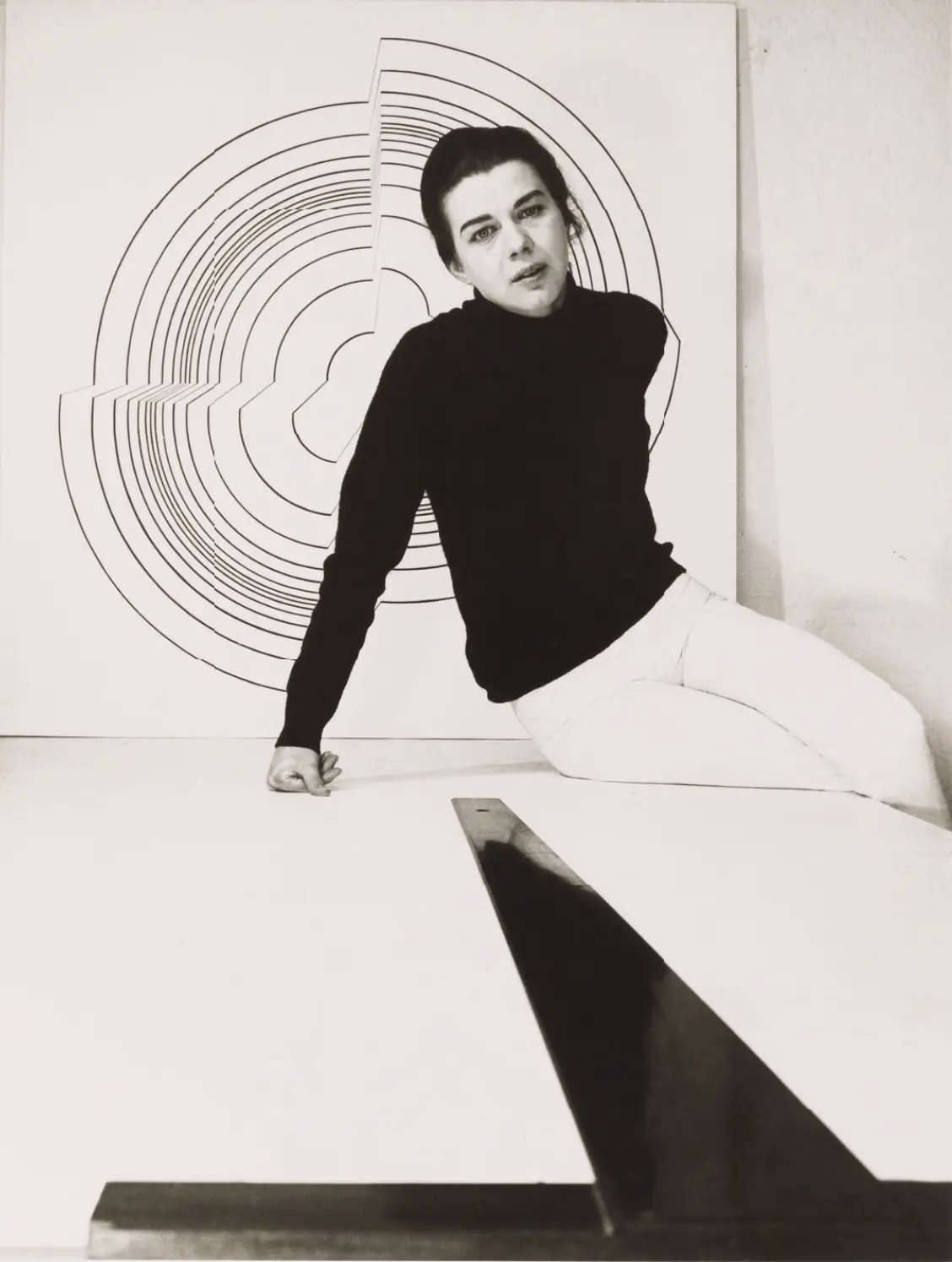 Bridget Riley photographed by J.S. Lewinski in her flat in Holland Park in 1964