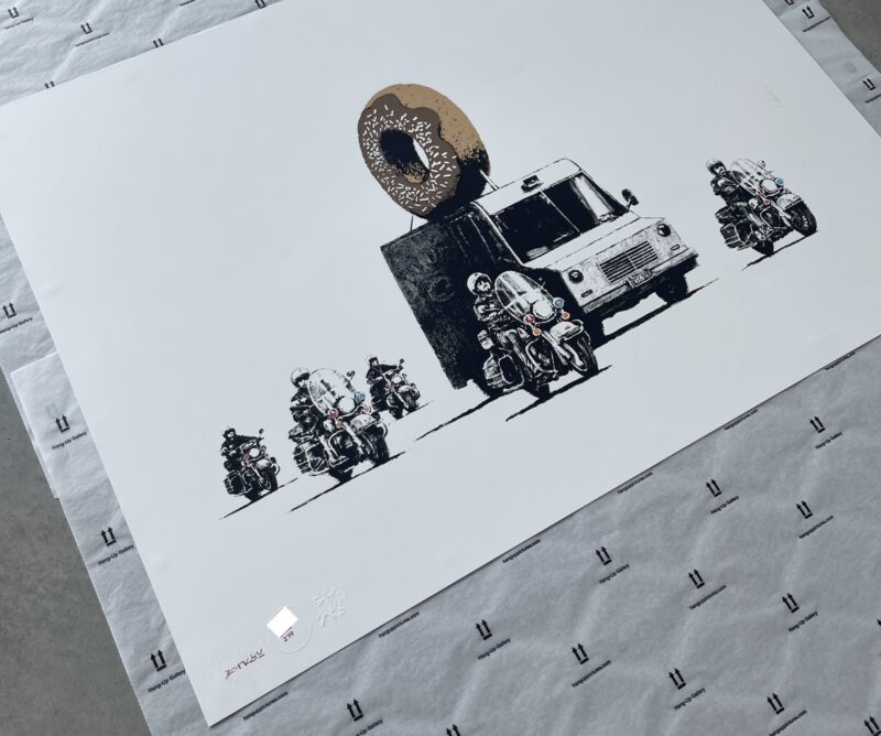 Banksy Chocolate Donuts Signed angle 2
