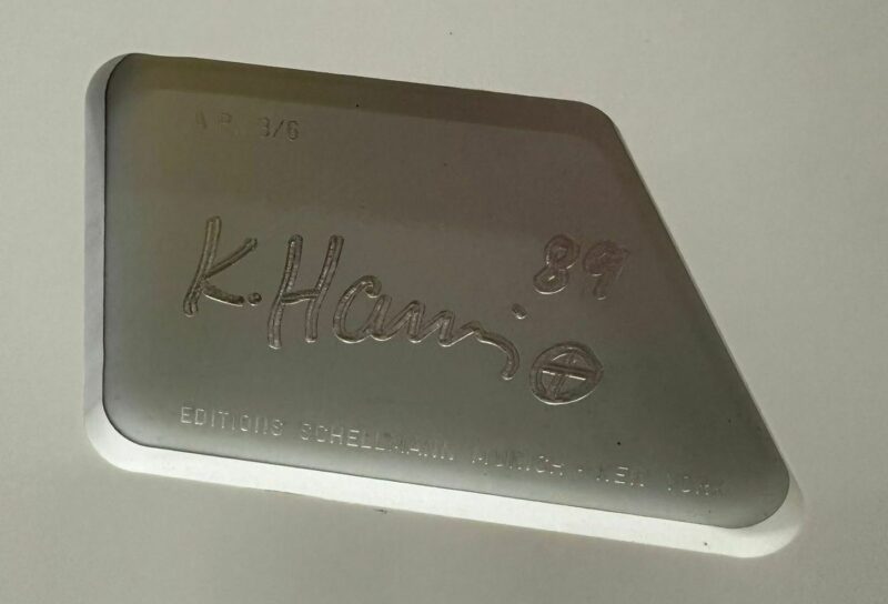 Incised signature and edition