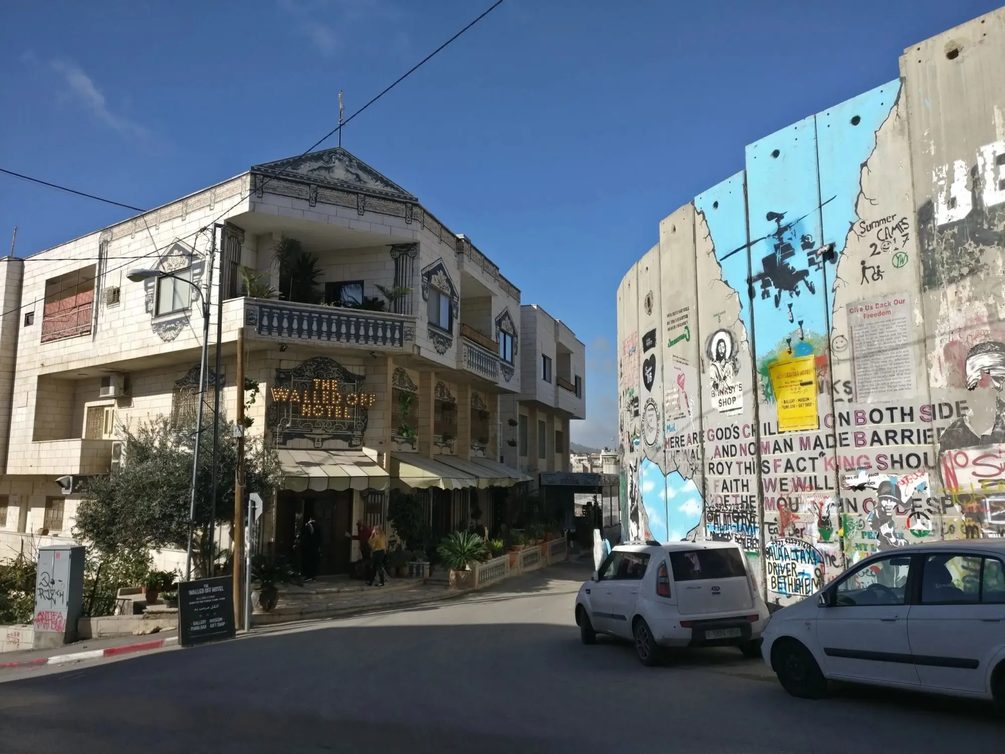 Banksy's Walled Off Hotel next to the Separation Wall in Bethlehem.