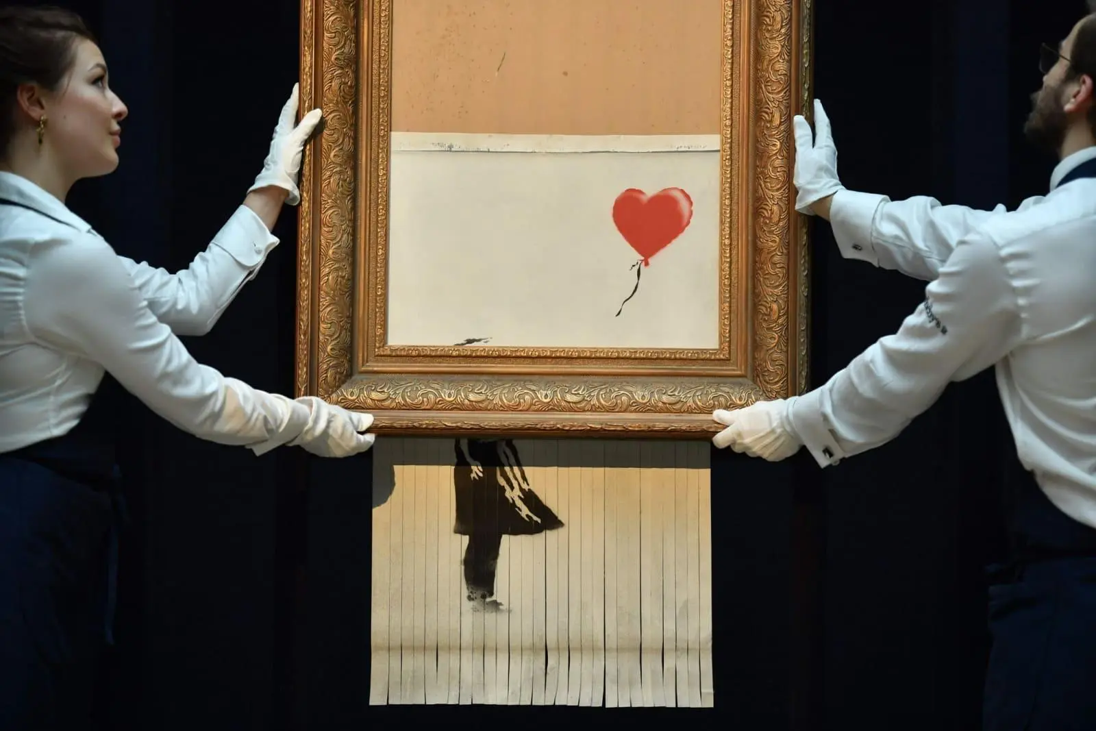 Banksy's shredded Girl With Balloon was renamed Love Is In The Bin.