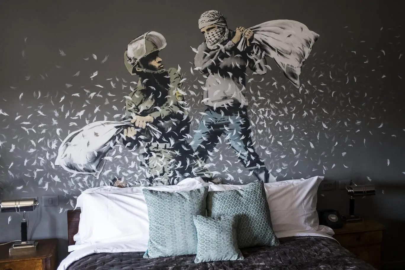 A Banksy mural in one of The Walled-Off Hotel's 9 guest rooms