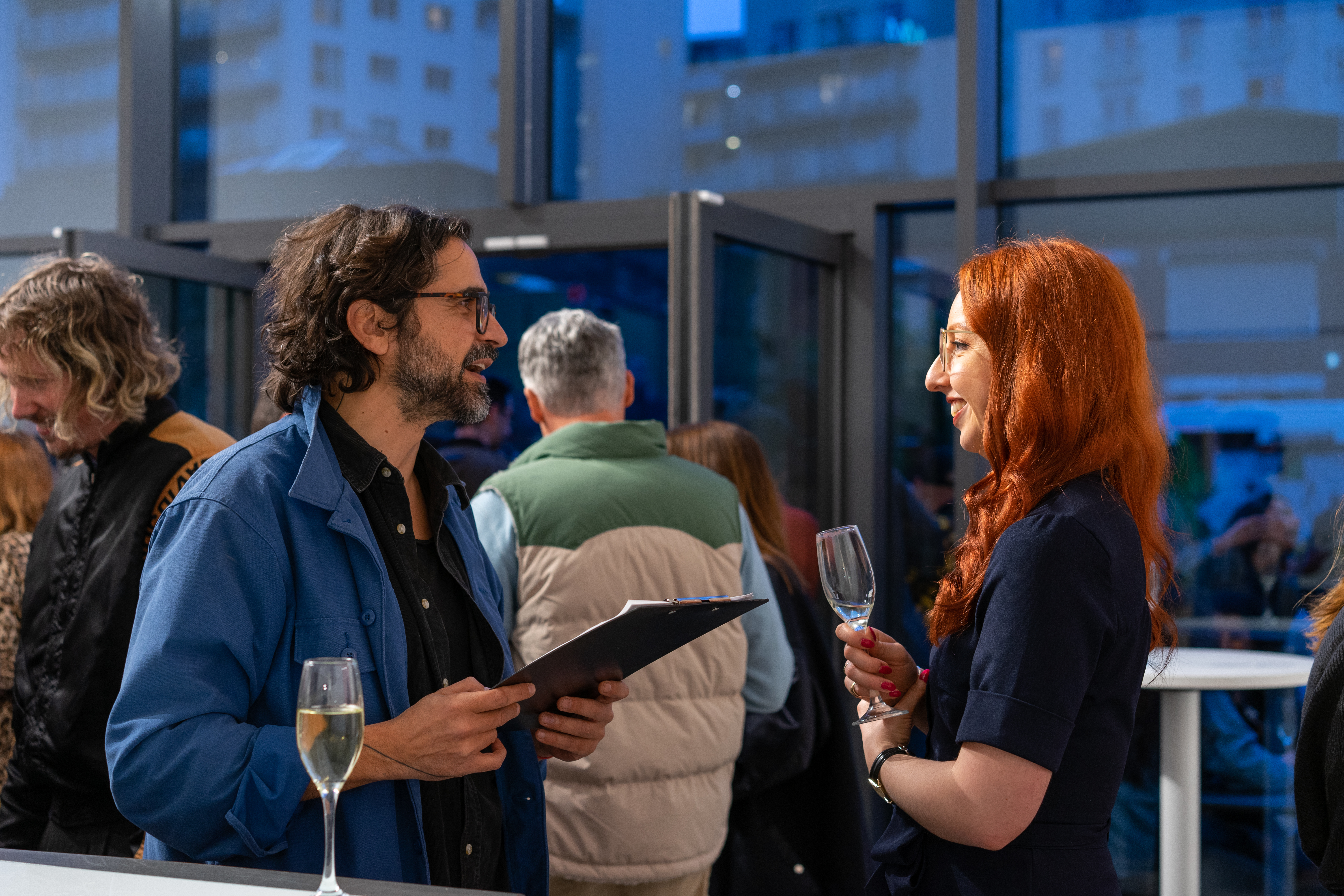 Guests in conversation and enjoying Age of Icons