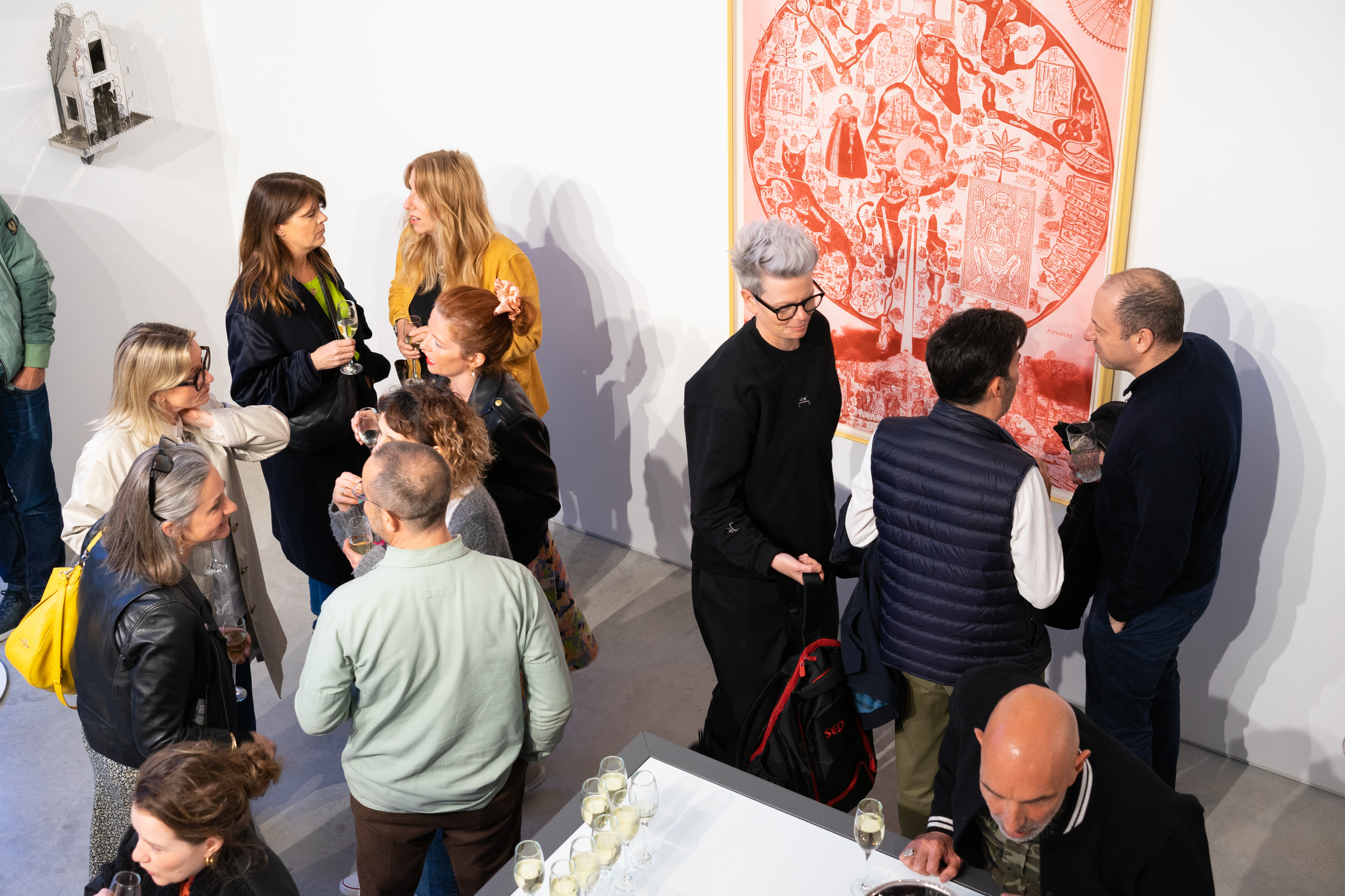 Guests in conversation and enjoying Age of Icons