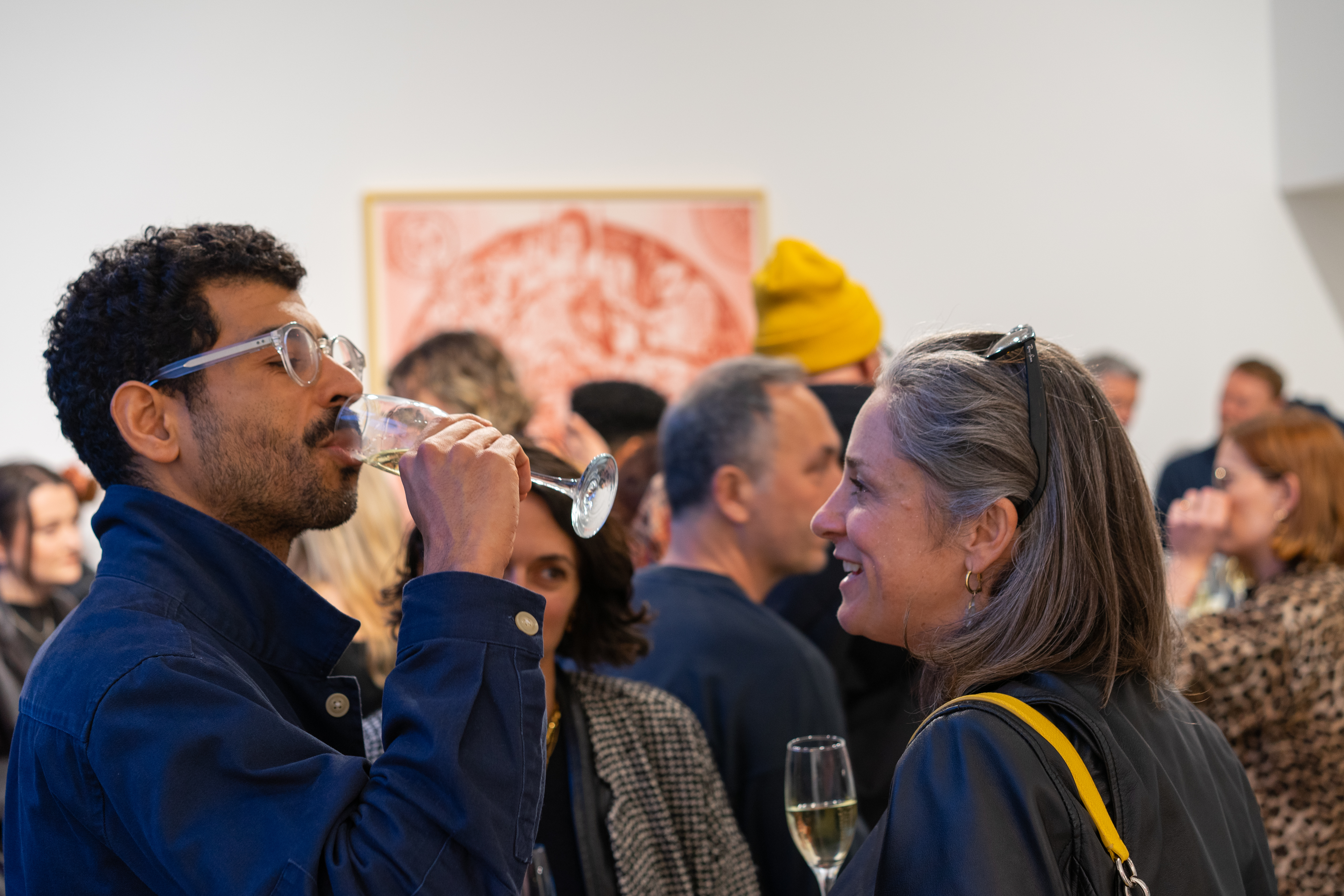 Guests in conversation and enjoying Age of Icons