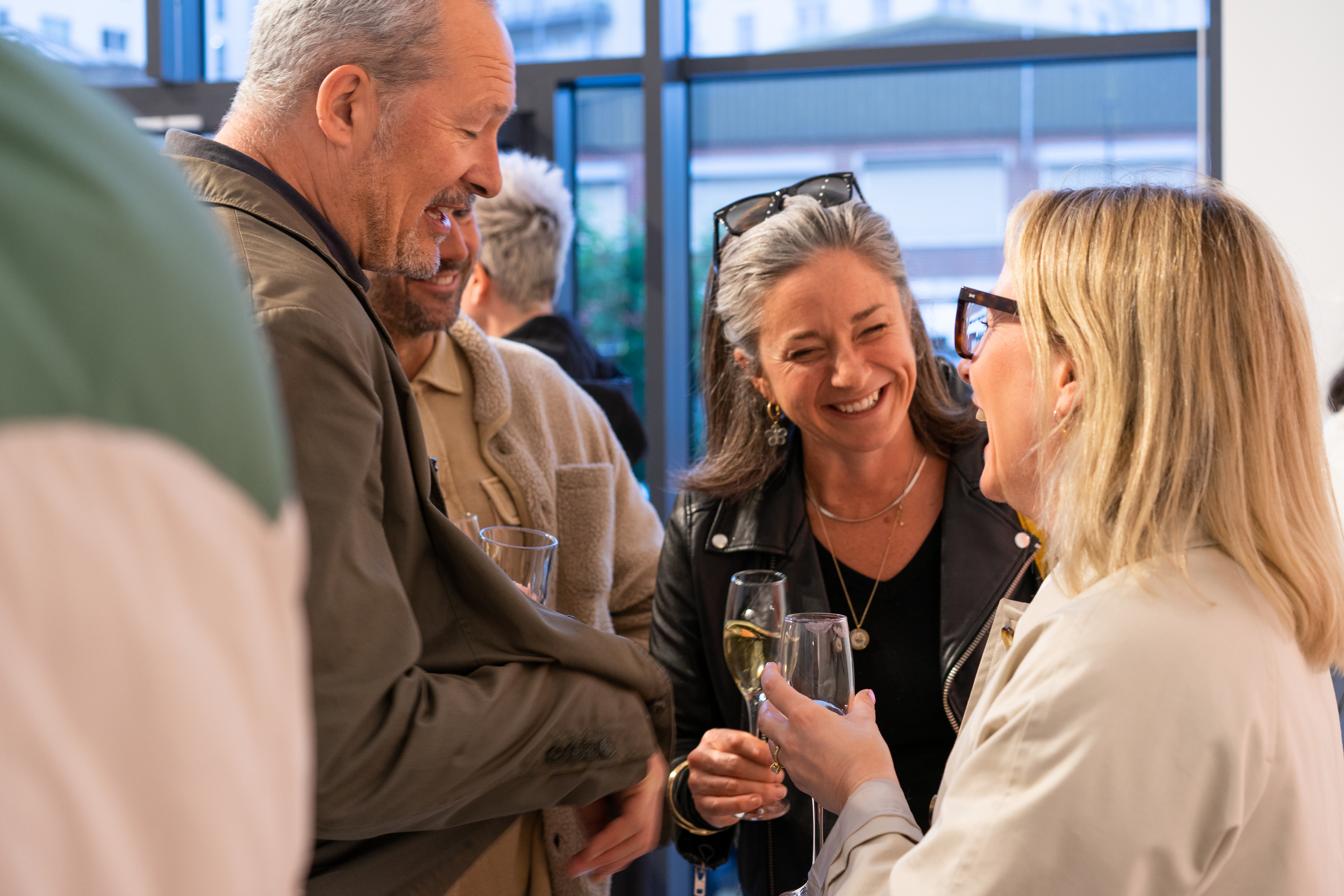 Guests in conversation and enjoying Age of Icons