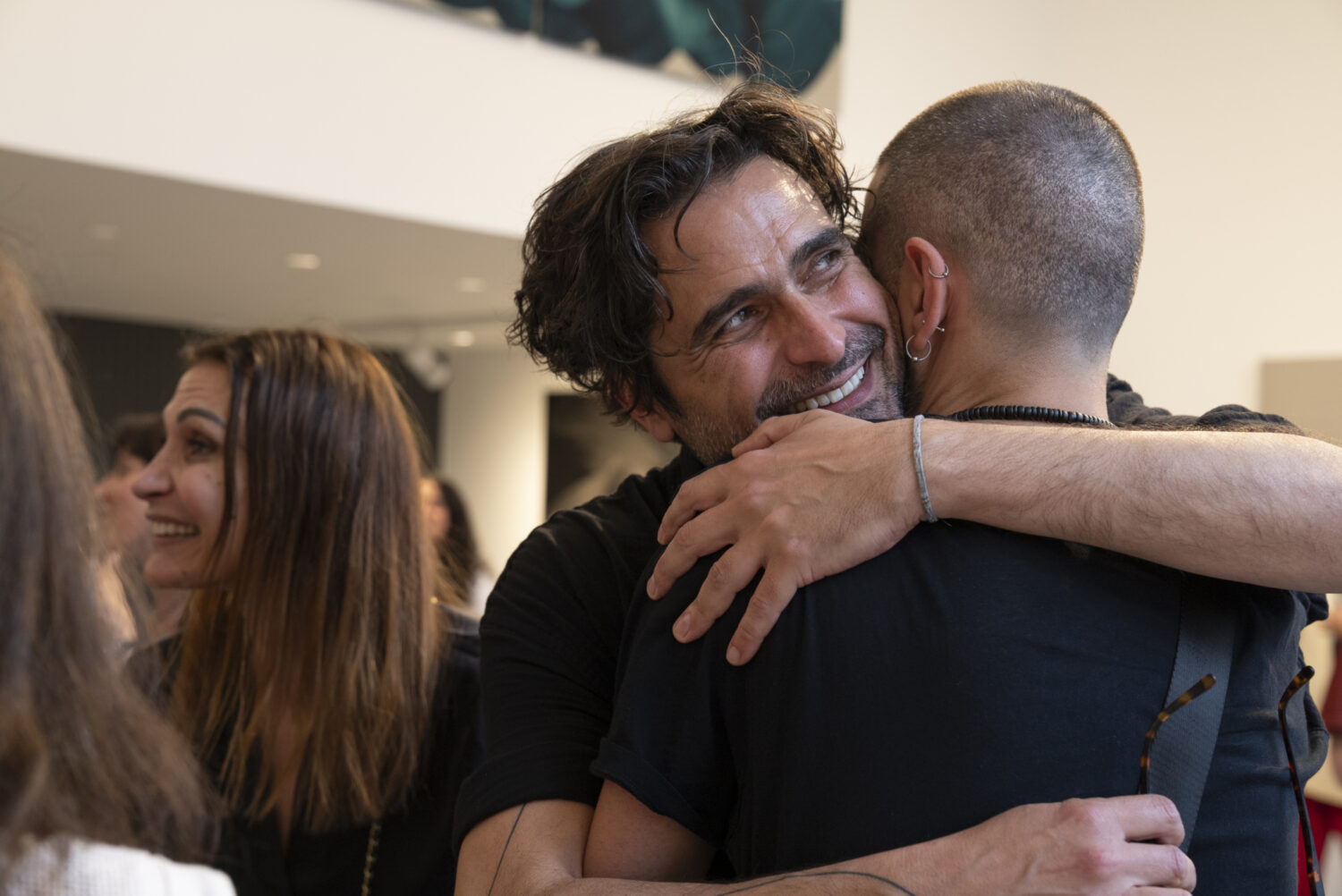 Friends and family celebrating the night with Kostas