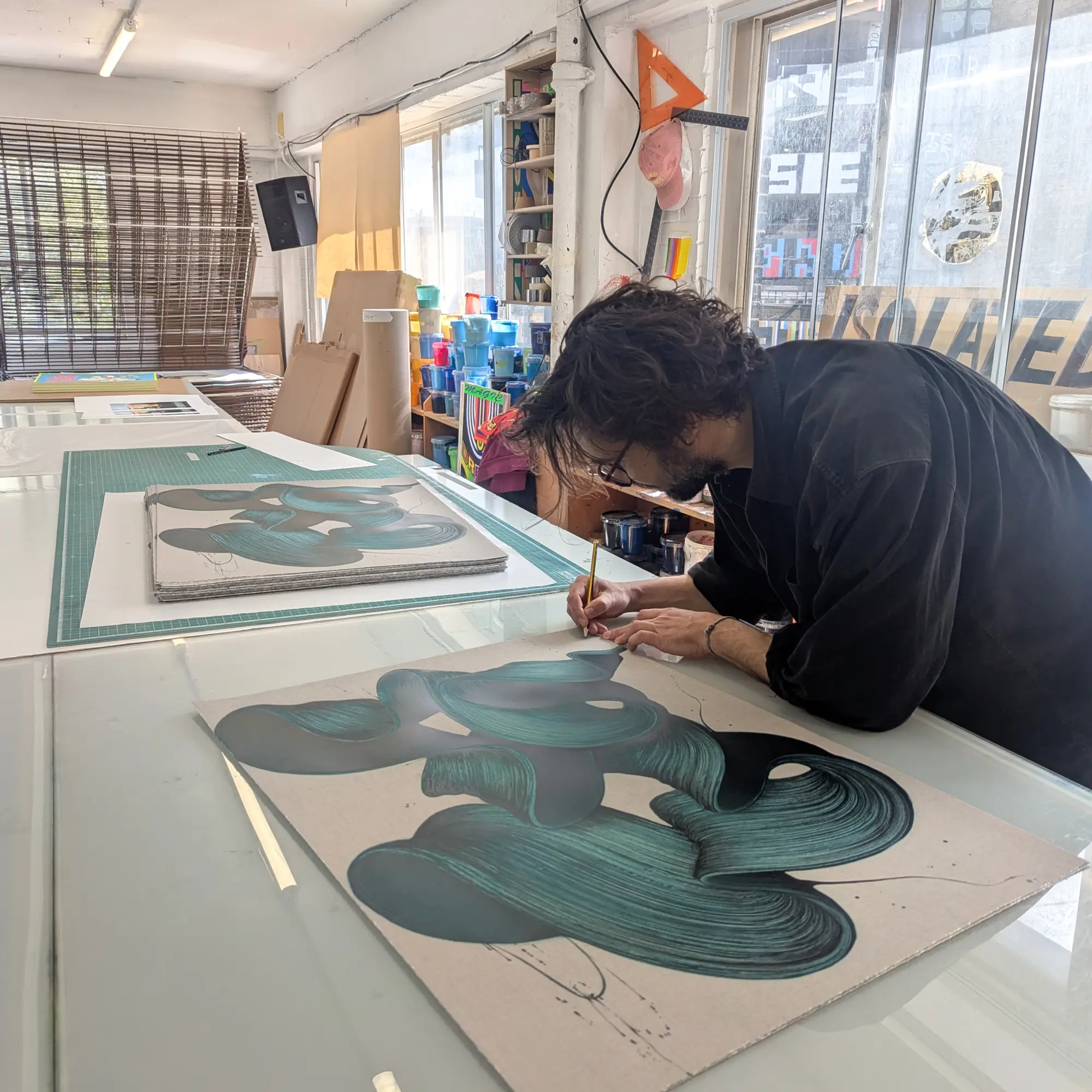Kostas Papakostas signing the edition at Jealous Print Studio
