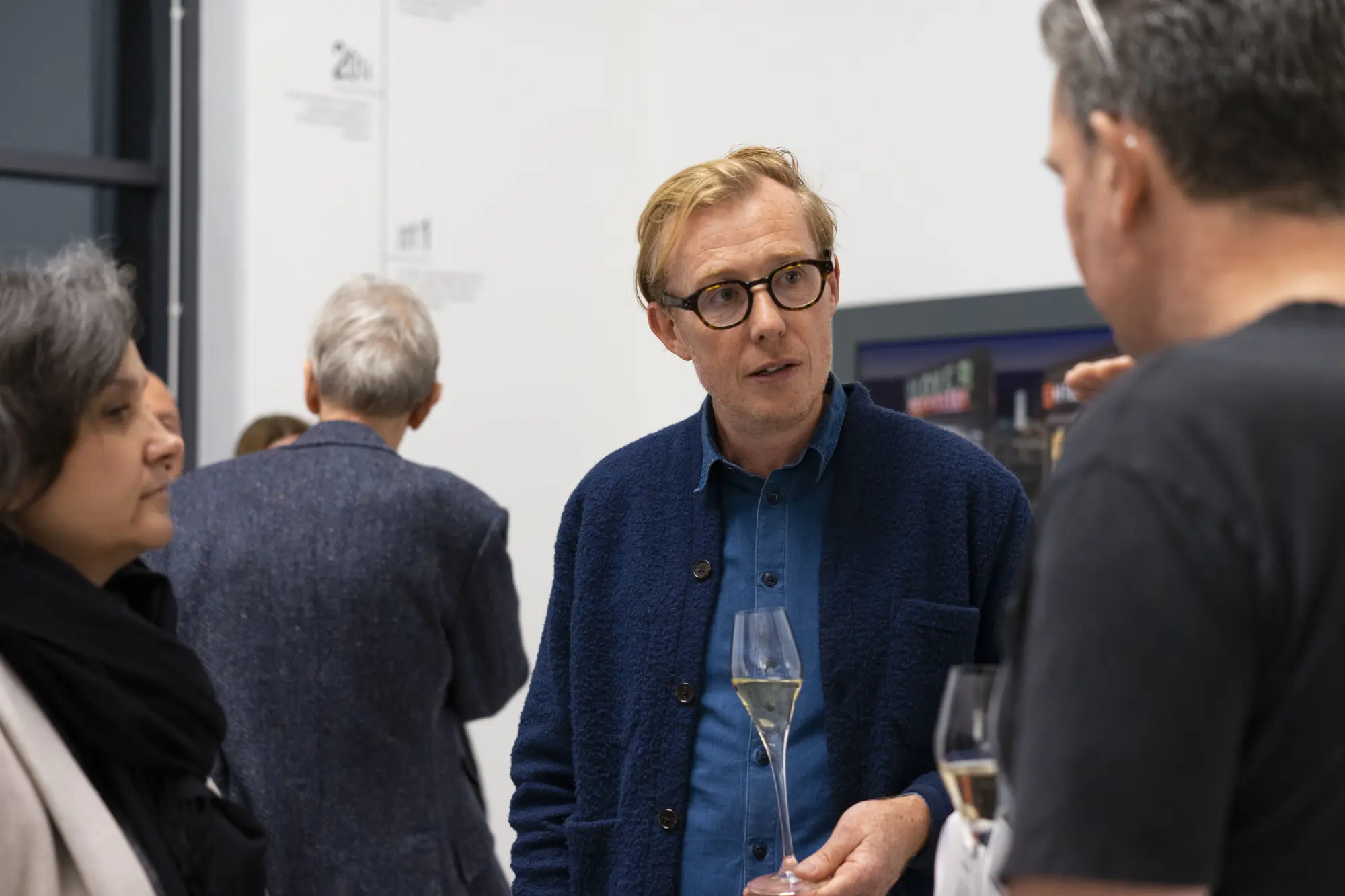 Gallery director Ben with friends during the evening.