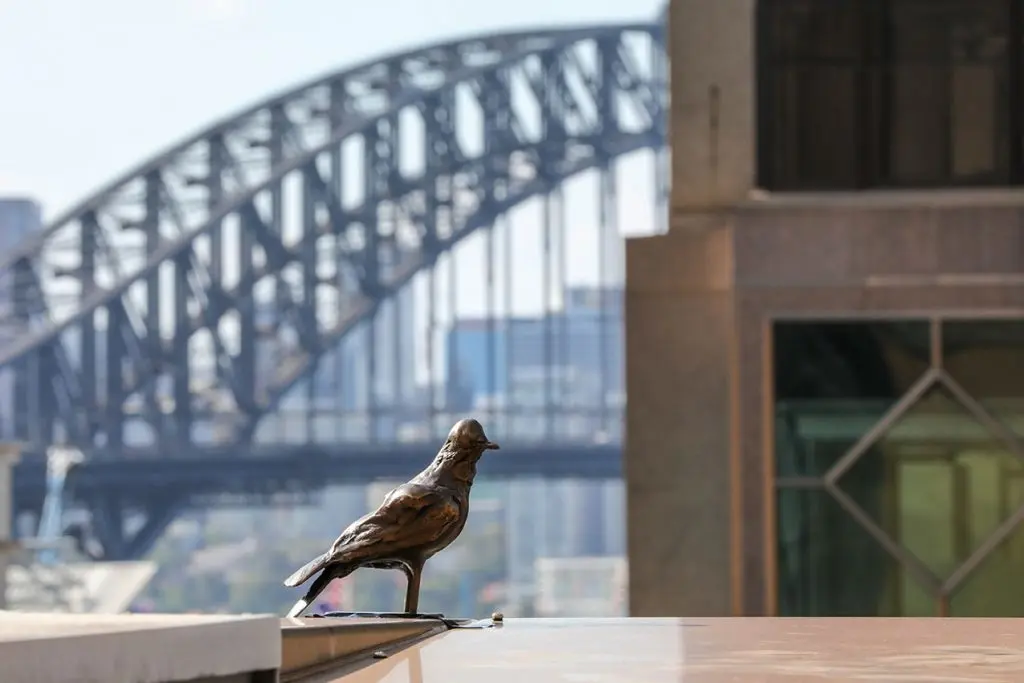 Tracey Emin, The Mother in Oslo next to one of 60 bird sculptures that make up The Distance of Your Heart in Sydney.