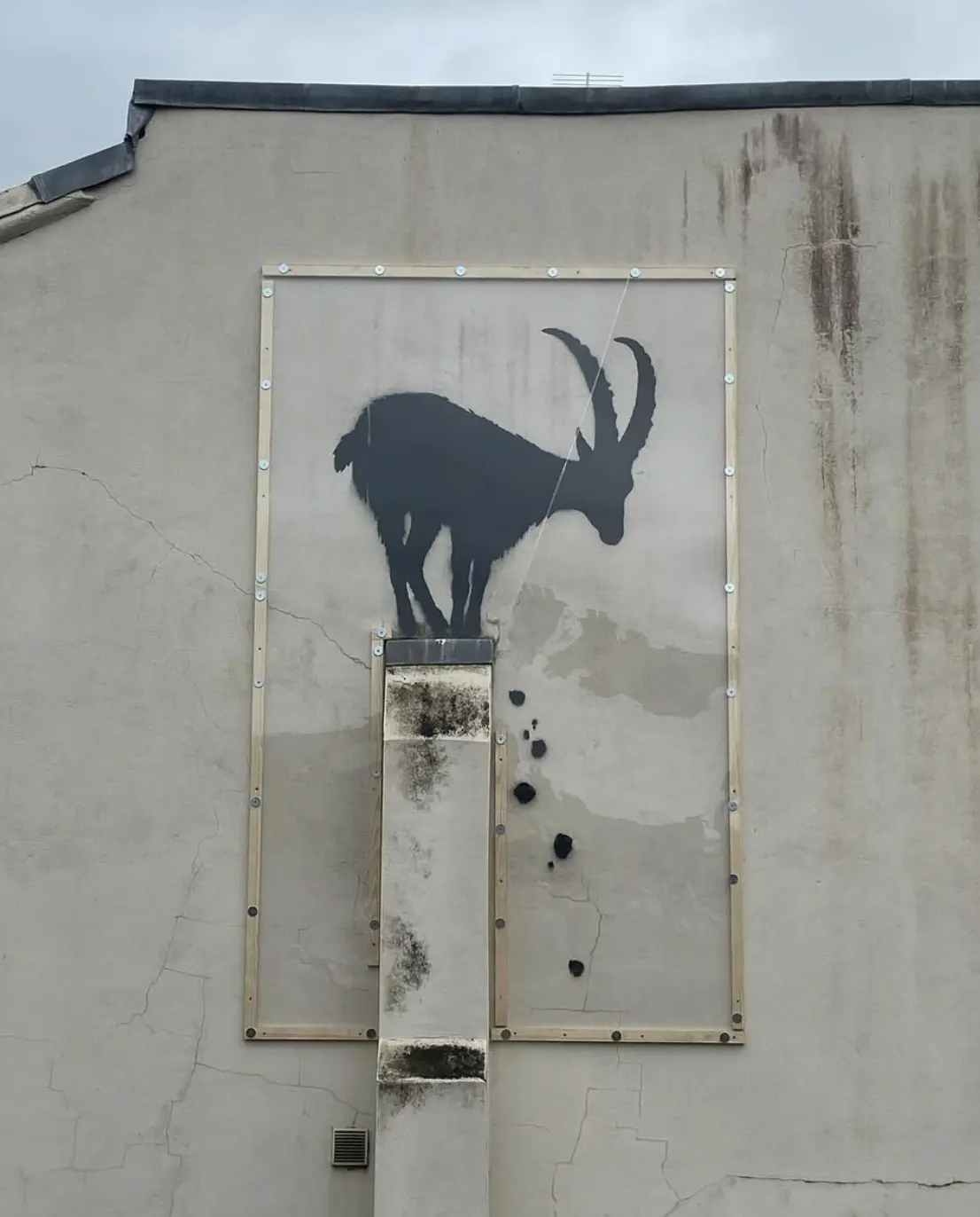 Banksy mural with perspex covering