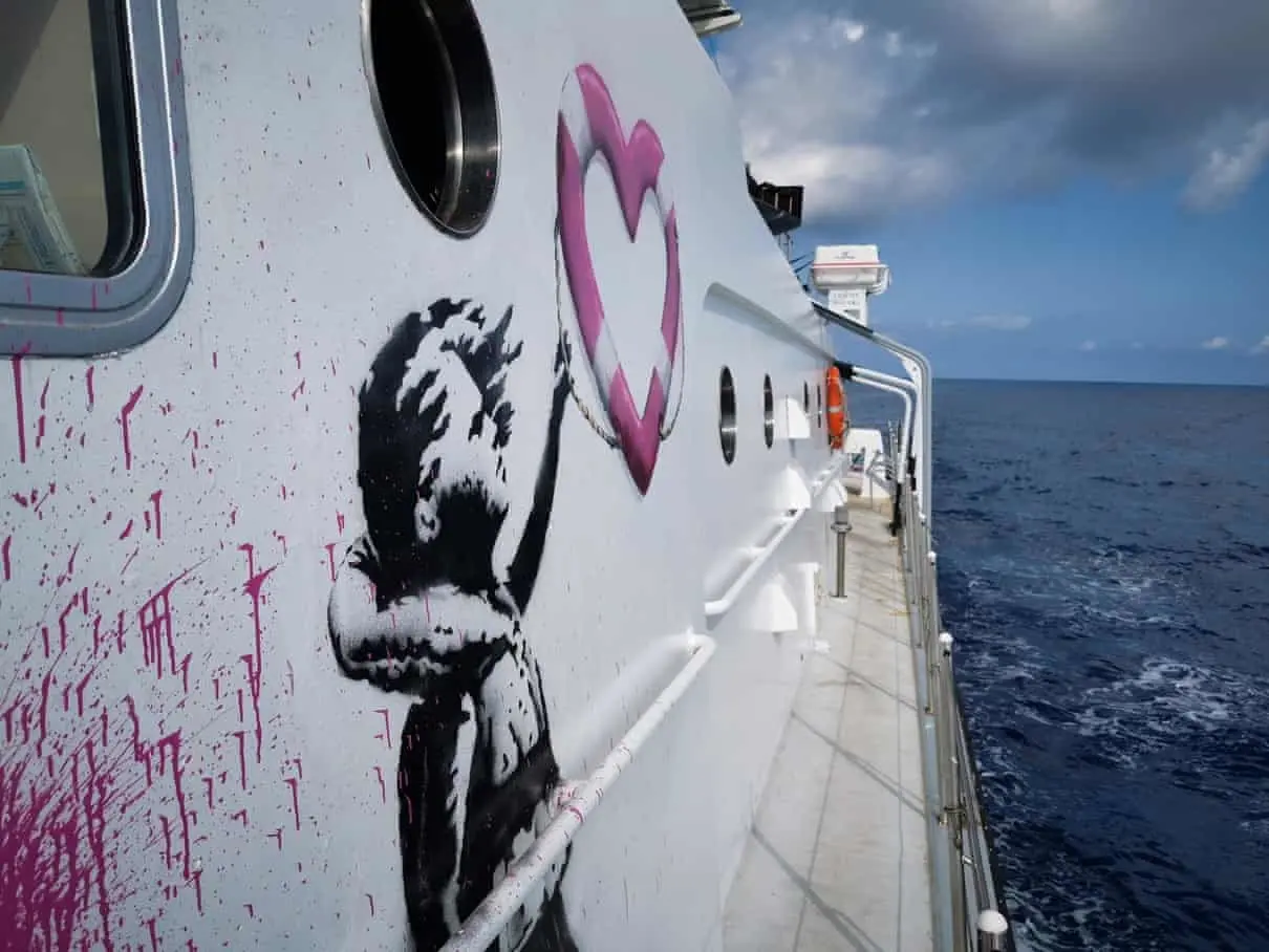 A remake of Banksy's most well known piece 'Girl with Balloon' decorates the exterior