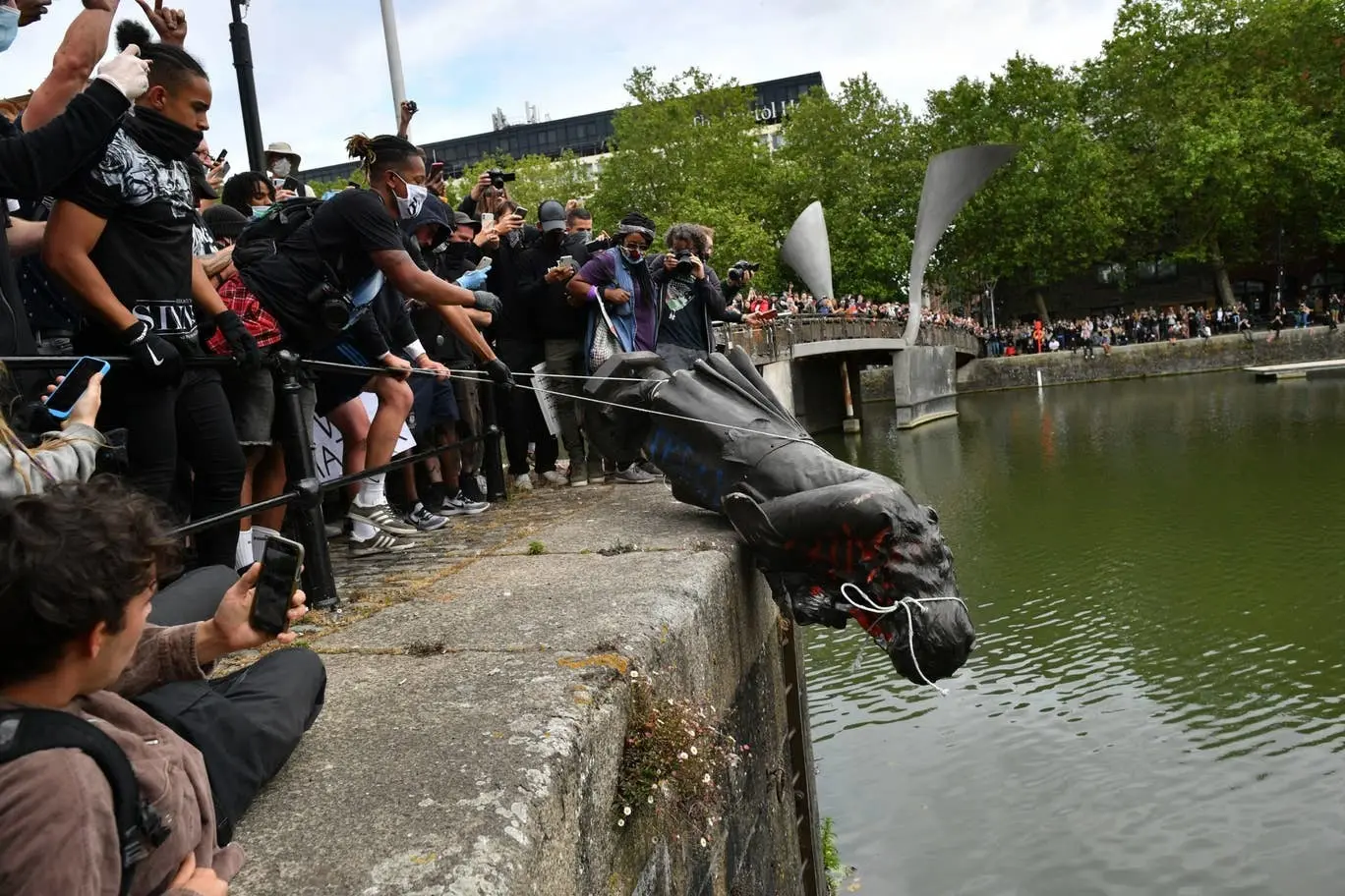 The historic moment Bristol protesters throw Colston's statue in the river