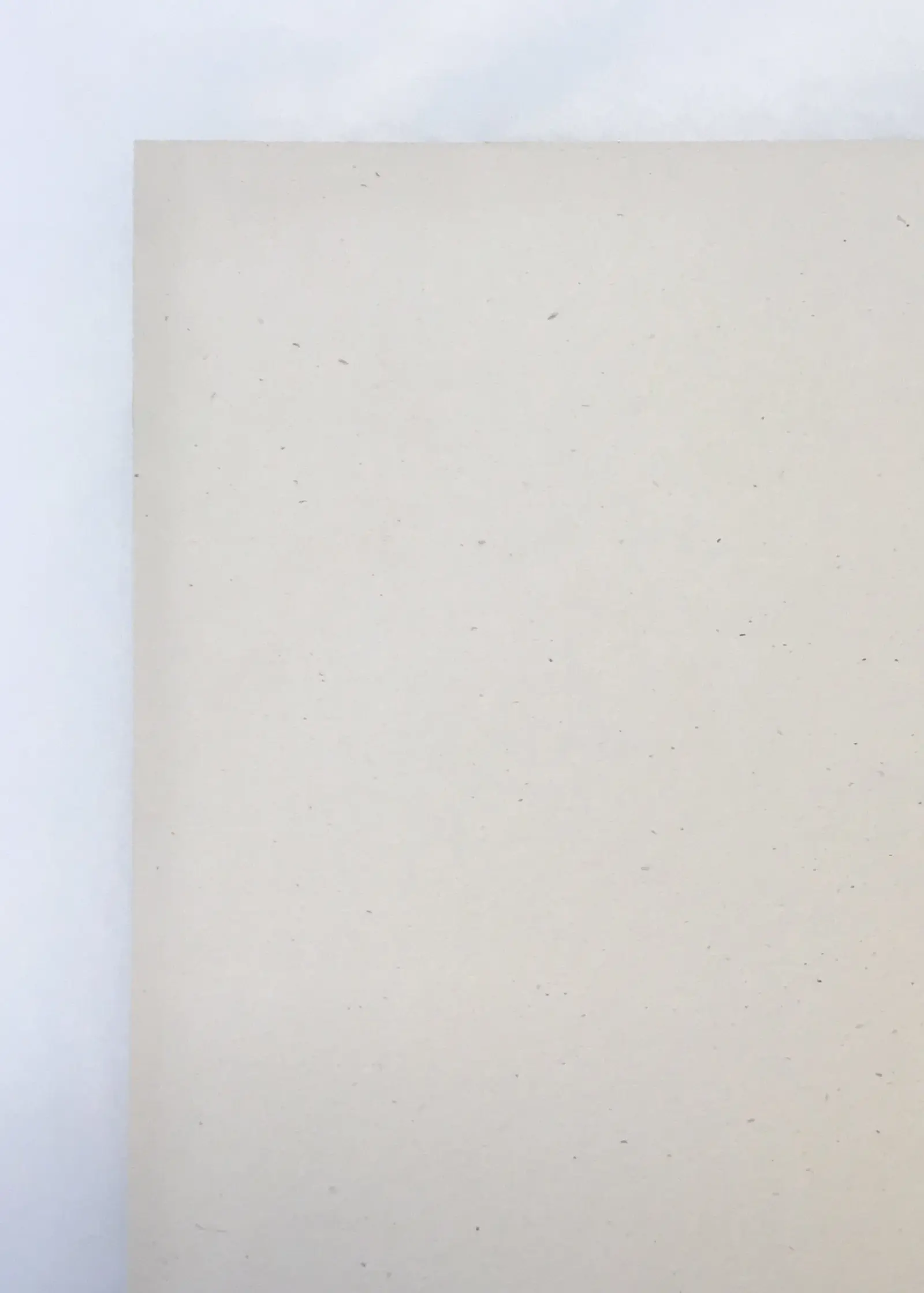 An example of a Banksy print that has been previously window mounted showing the signs of uneven light exposure on the front and tape on the back.