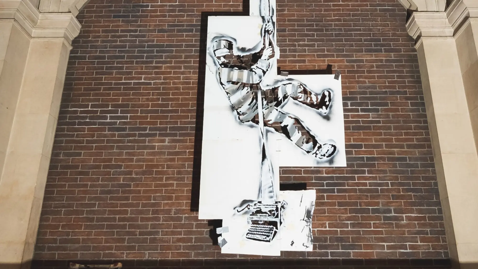 The stencil used by Banksy to make 'Create Escape' on display at the Art Club exhibition.