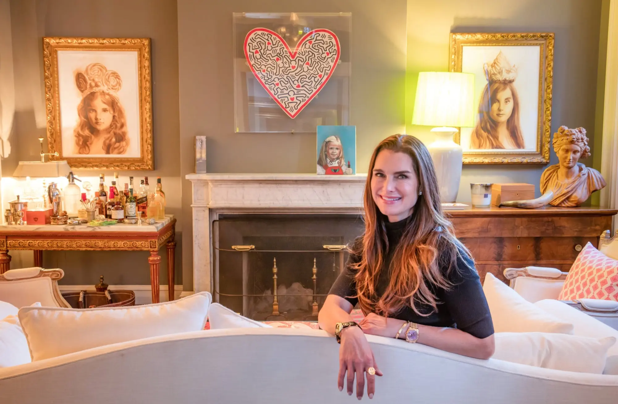 Brooke Shields in her Manhattan home, with a Keith Haring heart above her fireplace.