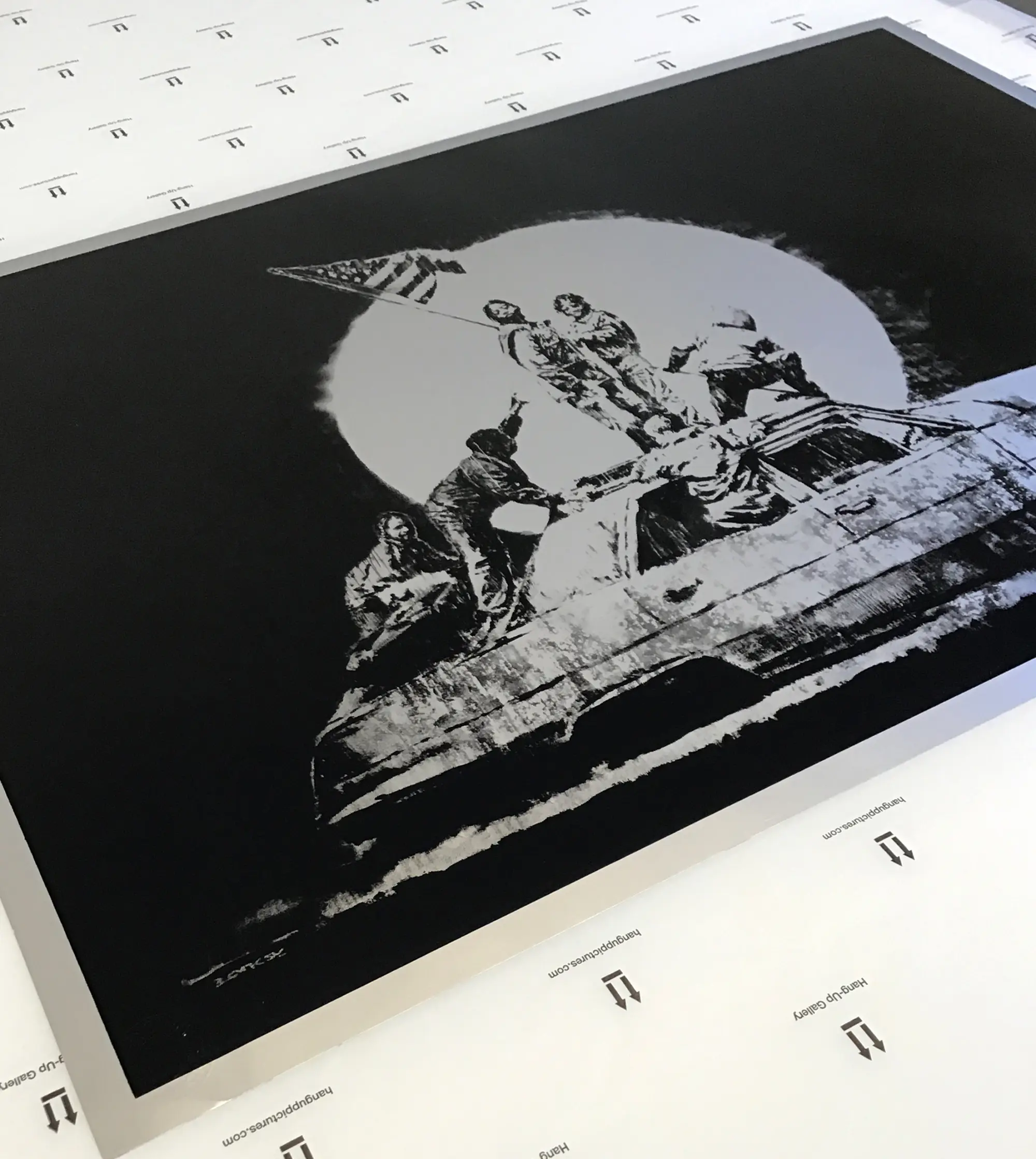 Flags, printed on chromolux paper, is one of Banksy's hardest prints to restore due to the quality of the support.