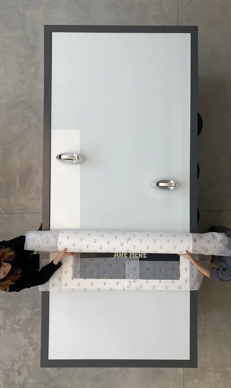 6. Now you can start rolling your print up, making sure to roll in the direction of the grain.