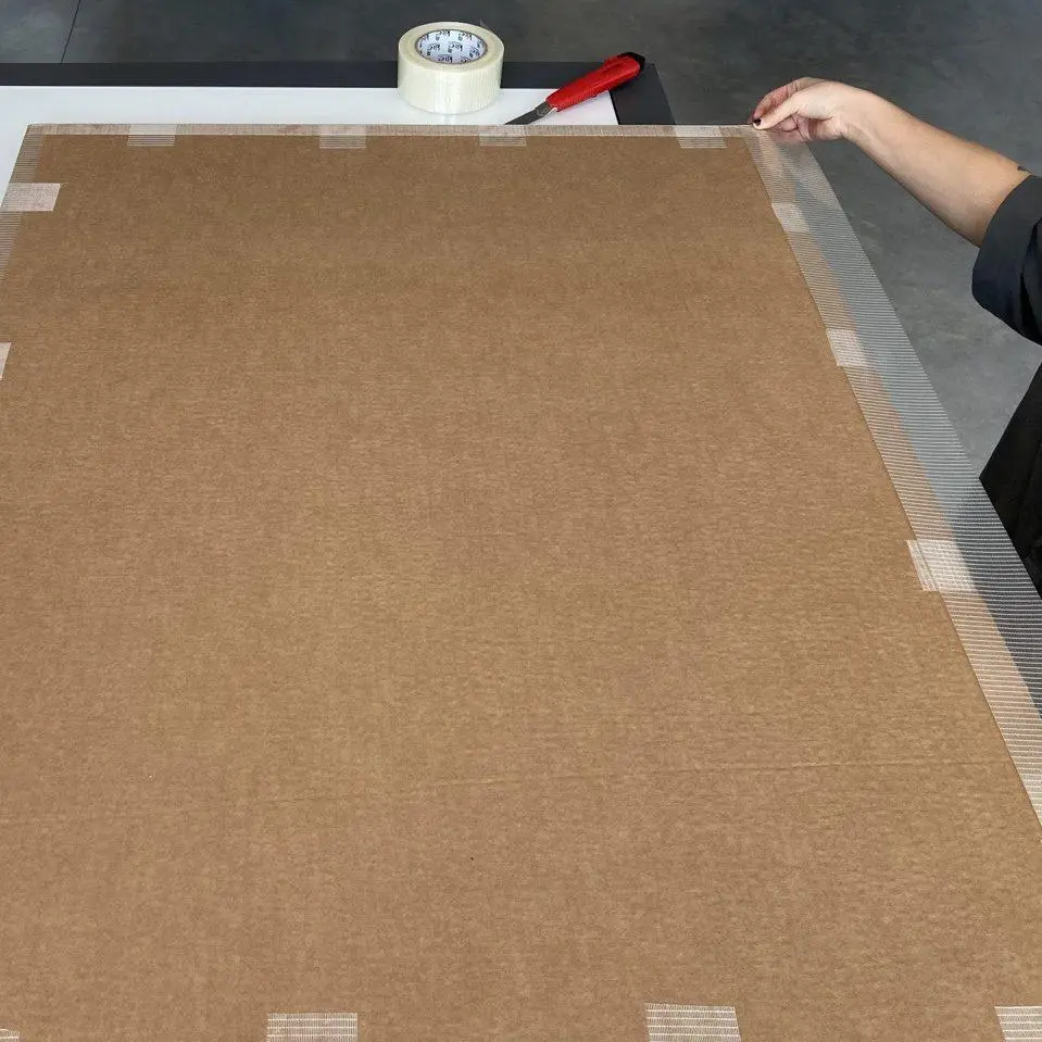 11. Using heavy duty tape, start taping up your flat pack making sure to use small pieces lengthwise and long pieces widthwise to completely seal off any gaps.