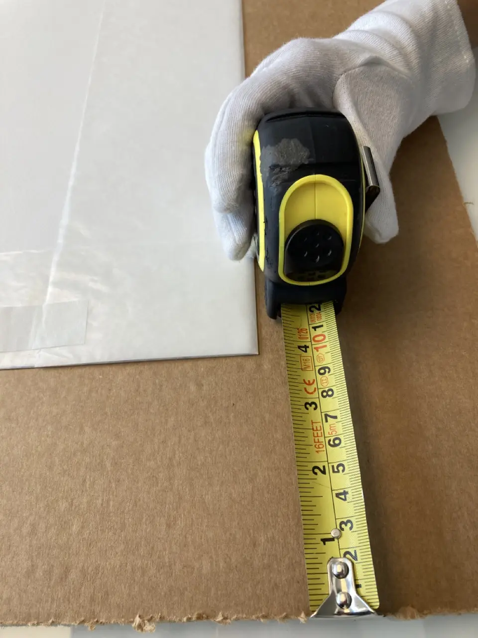 2. Choose a flat pack (again this can be cardboard, triwall, quadwall or MDF depending on where your artwork is going) that leaves a 5 to 10 cm border once the print is placed in the middle.