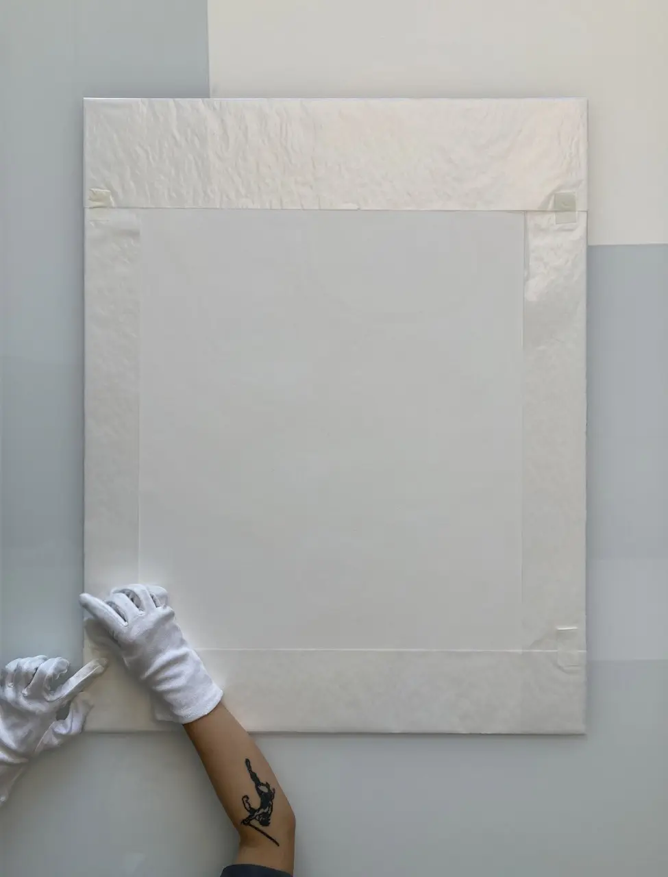 If you don't have access to Glassine paper you can use acid-free tissue paper.