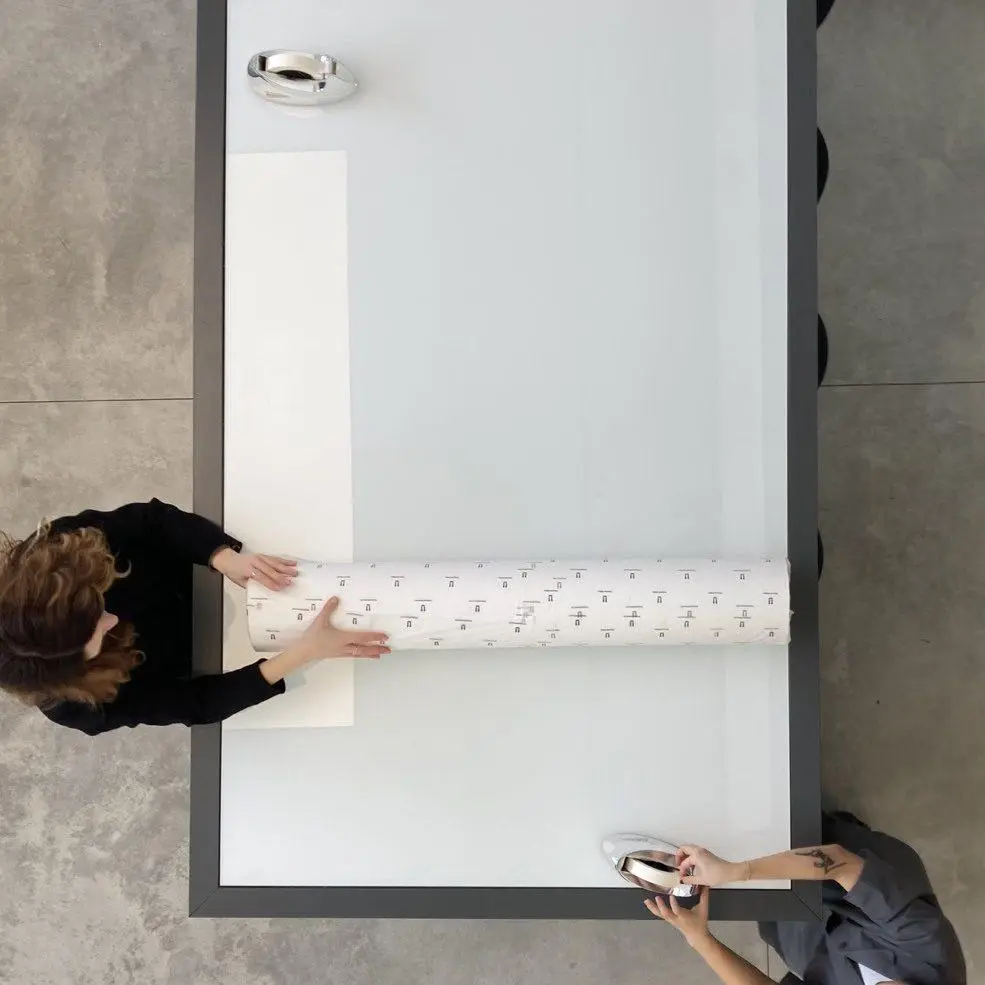 7. Once your print is rolled, tape the rolled edge with enough masking tape to ensure it doesn’t come undone.