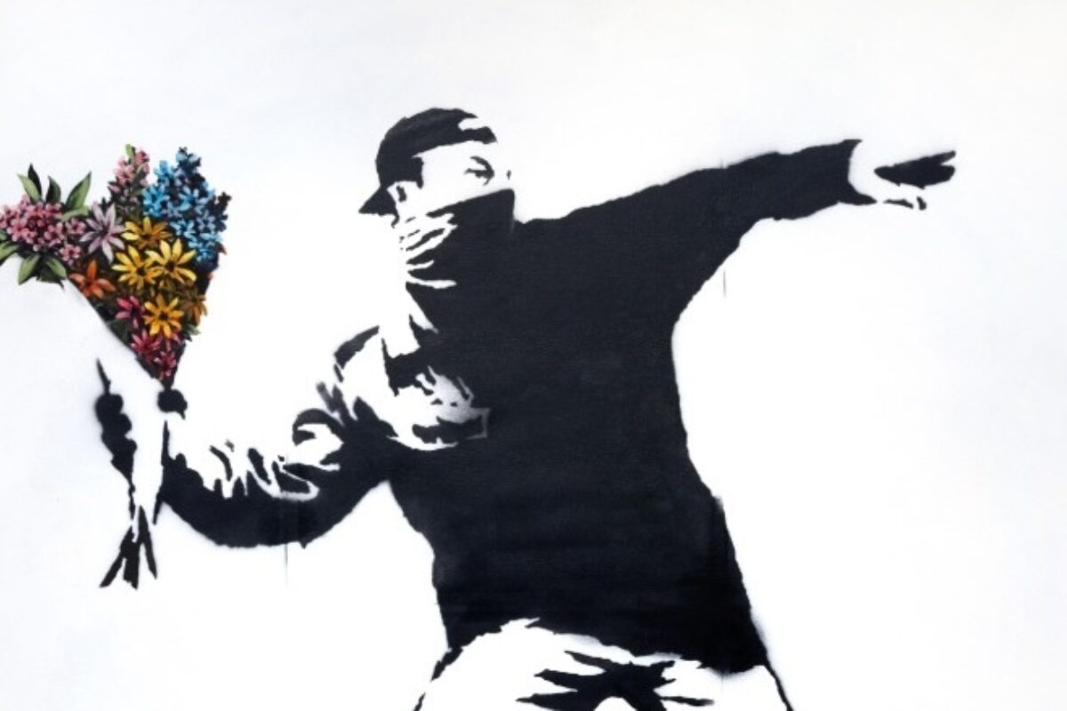 A Life Size example of Banksy’s Love Is In The Air Headlined Sotheby’s Evening Sale