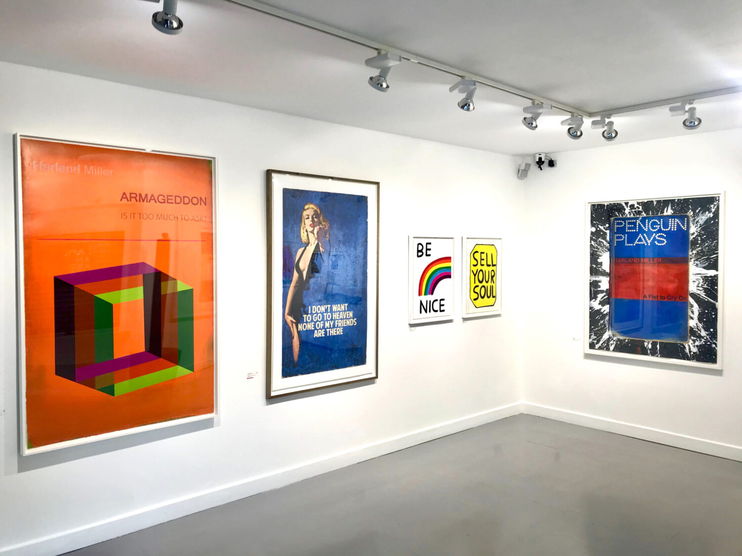 Works by Harland Miller, The Connor Brothers and David Shrigley all framed with a high float