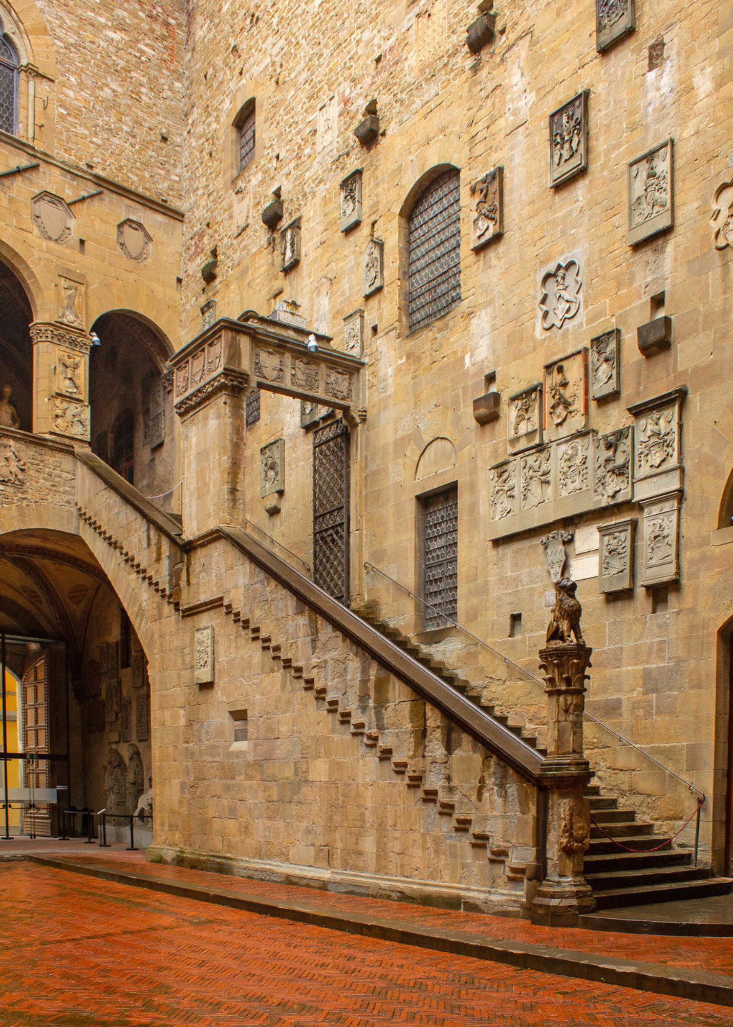 The beauty of the city has often served as inspiration for the artist. Above, the courtyard of the Bargello Museum and a detail of Gjoen's edition 'We the Living Are to Blame for the Painfulness of Death'.
