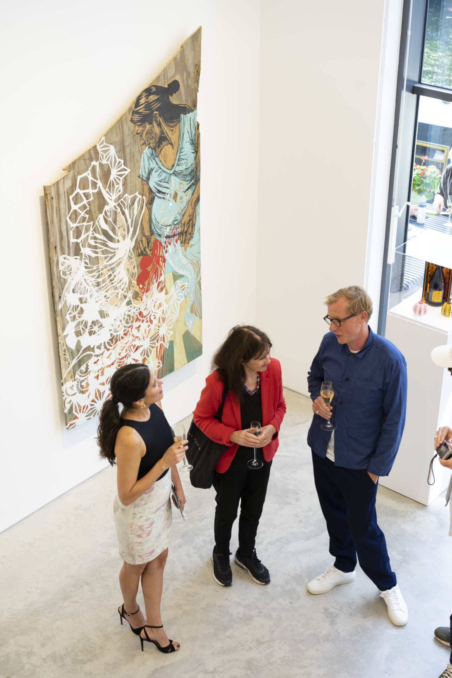 Gallery Manager Laura Rivas-Lopez and Founder, Ben Cotton with guest.