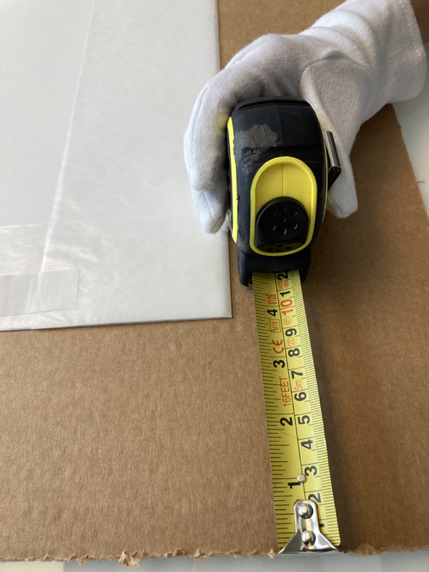 2. Choose a flat pack (again this can be cardboard, triwall, quadwall or MDF depending on where your artwork is going) that leaves a 5 to 10 cm border once the print is placed in the middle.