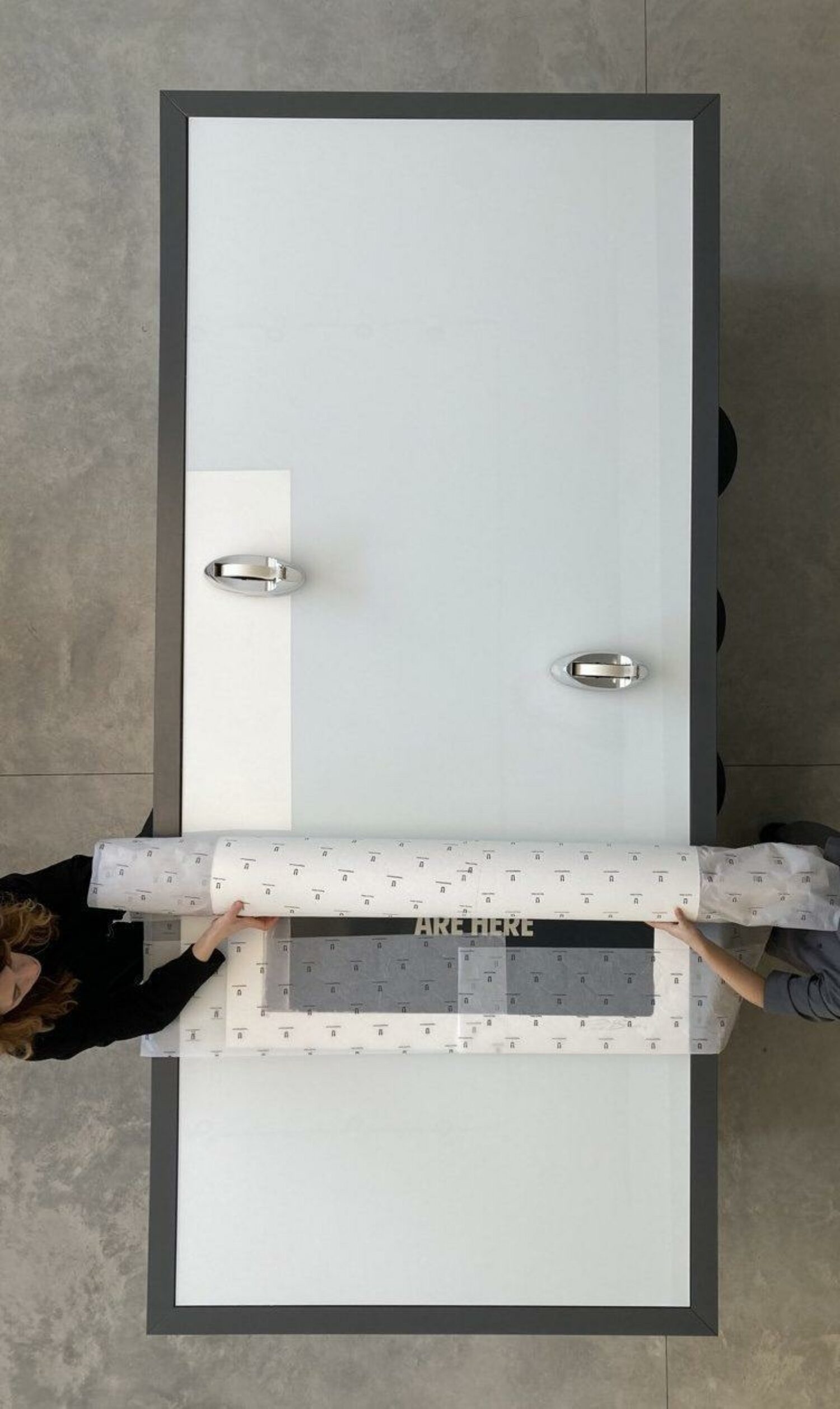 6. Now you can start rolling your print up, making sure to roll in the direction of the grain.