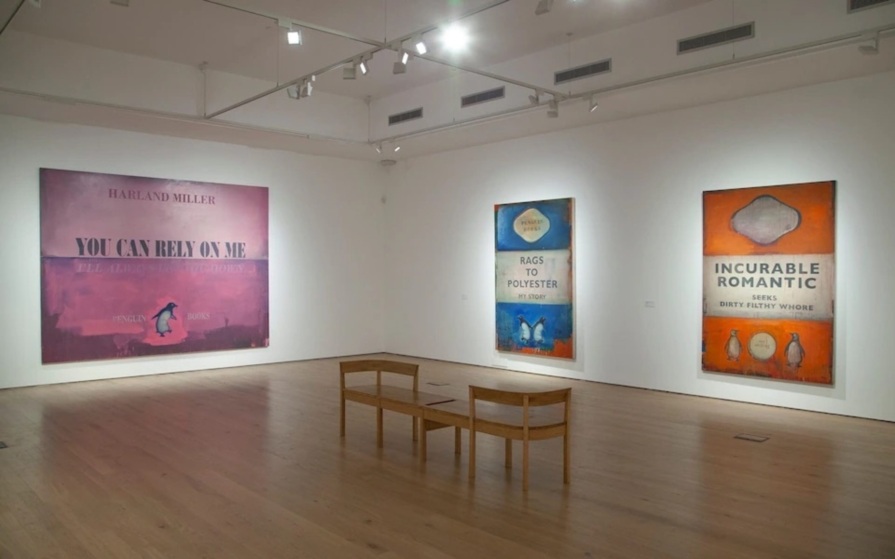Installation view of Harland Miller's Rags to Polyester – My Story, reportedly owned by Rishi Sunak and Akshata Murthy next to Incredible Romantic, once in George Michael’s art collection.