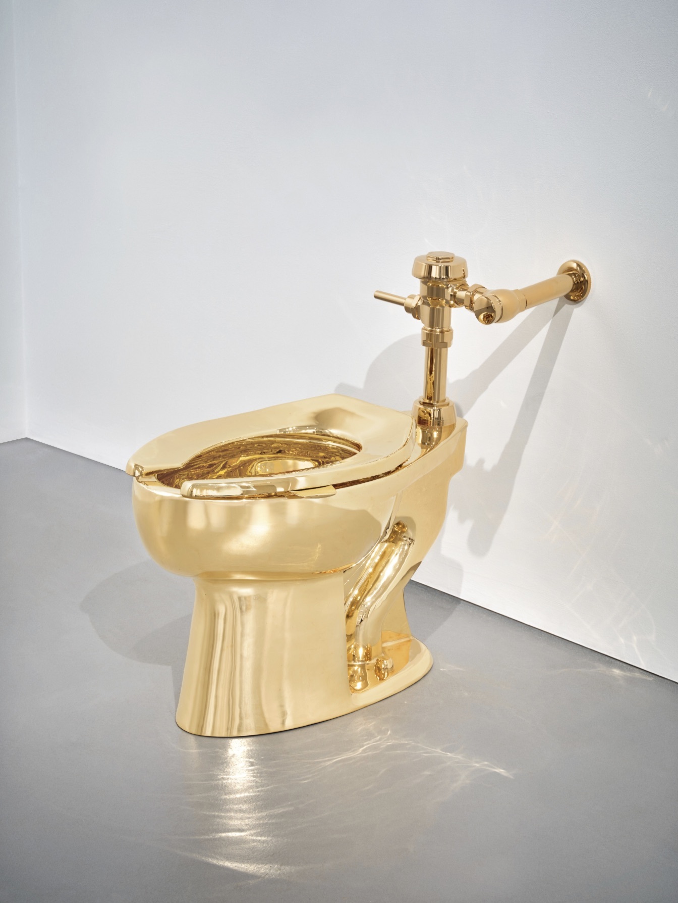 1. The Gold Standard of Satire – Maurizio Cattelan’s America