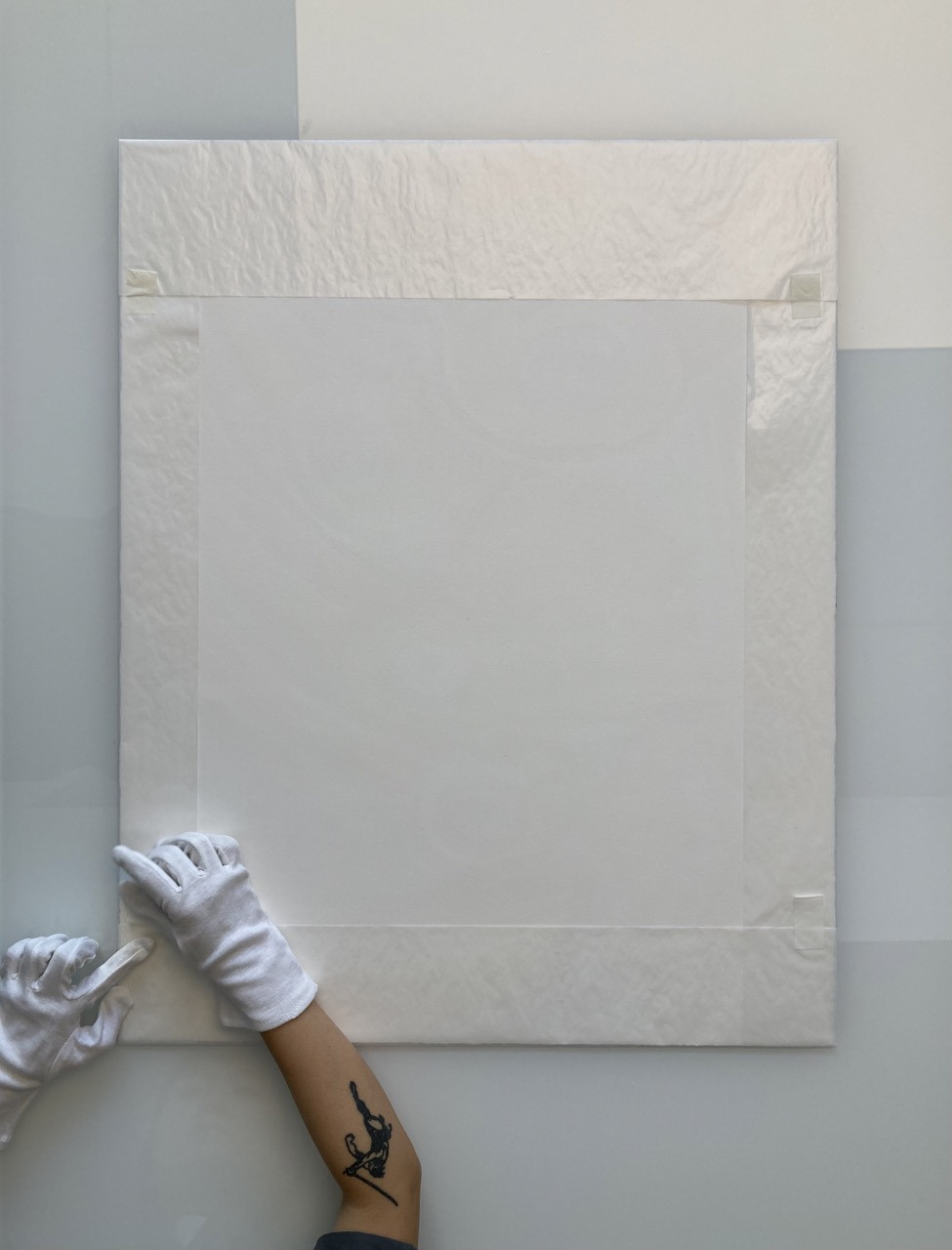 If you don't have access to Glassine paper you can use acid-free tissue paper.