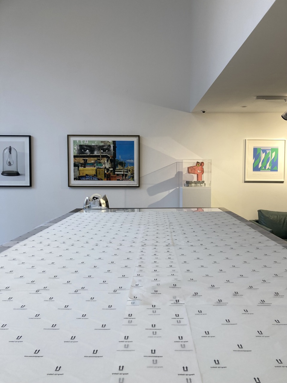 3. Place a piece of tissue paper on your work surface that is larger than the size of the print - you can use more than one if needed.